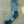 Climatesox.com CLIMATES (rebranding as E-Zmates) Men's Linkable Merino Wool Light Hiking Crew Sock flat lay on natural wood surface showing heathered gray fabric with navy, red, and teal stripe detail